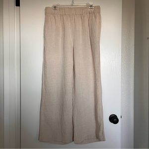H&M Linen Pants. Wide leg with pockets. Elastic waist.  Cream color. Size medium